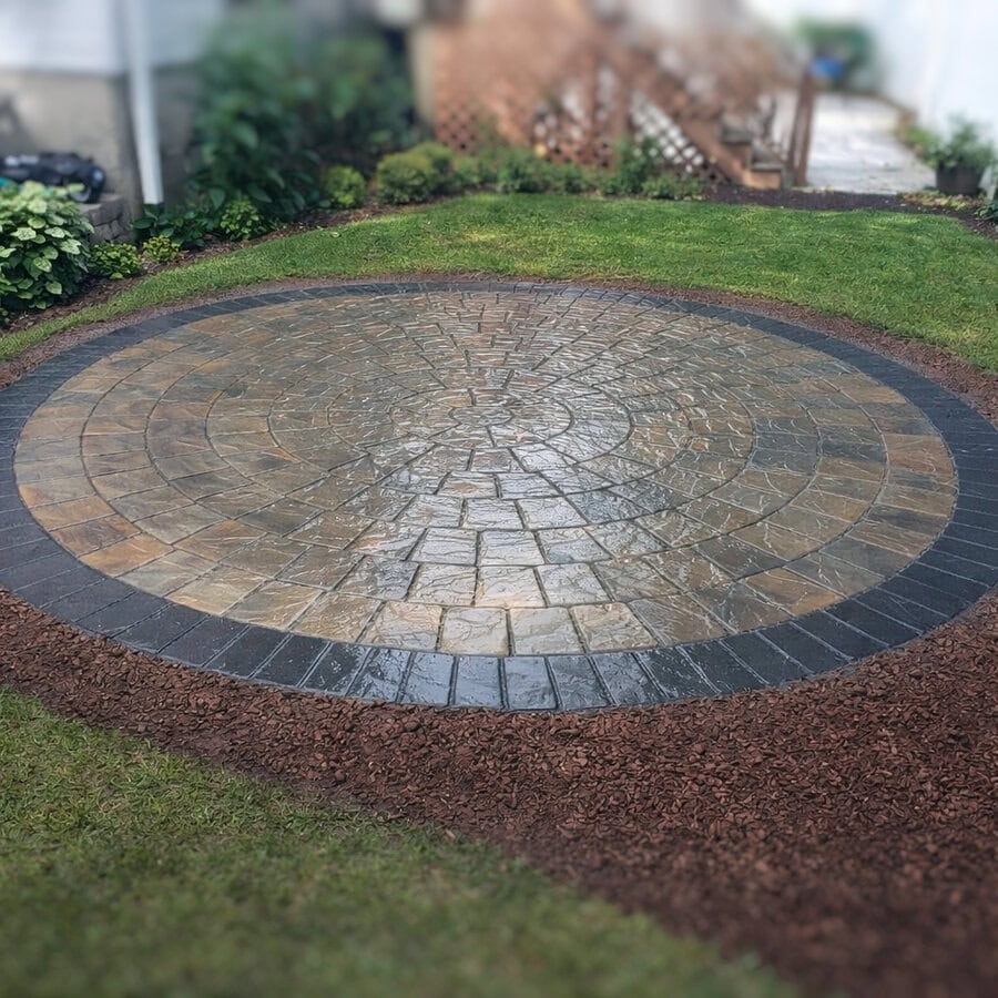 Circular paver patio installed by hardscape contractor Cornerstone Patio and Wall in Torrington Connecticut serving Northwest CT, Western Massachusetts, and Eastern New York.